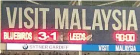  ??  ?? Top: Scoreboard at the Cardiff City Stadium after yesterday’s match against Leeds United. Below: Kenneth Zohore (rtight) celebrates after scoring against Leeds.