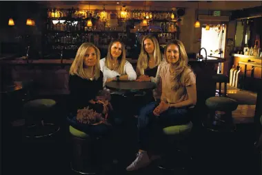  ?? RANDY VAZQUEZ — STAFF PHOTOGRAPH­ER ?? Lynne Rovai, left Lindsey Beall, Stephanie Whaley and Kristen Carlson gather at Goosetown Lounge in the Willow Glen neighborho­od of San Jose on Monday. A campaign has raised enough funds to keep the bar open for the immediate future.