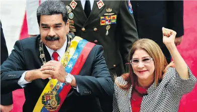  ?? FEDERICO PARRA / AFP / GETTY IMAGES ?? Venezuelan President Nicolas Maduro and his wife Cilia Flores, who has been described as her husband’s “strong arm.”