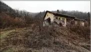  ?? DARKO VOJINOVIC / AP ?? An abandoned house is seen in the village of Blagojev Kamen, Serbia. A shrinking population is happening so fast it’s considered a national emergency and the United Nations has stepped in to help.