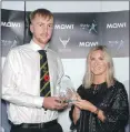  ?? ?? Mowi South Player of the Year, Cally McNaughton of Col Glen, is presented with his award by Mowi’s Jayne MacKay.
