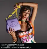  ??  ?? Hailey Bieber in Versace’s spring 2021 advertisin­g campaign.