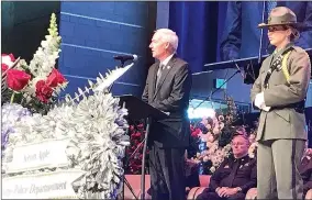  ?? TIMES photograph by Annette Beard ?? “Because of you, our nation is stronger and survives… and we have hope for the next generation as well,” said Arkansas Governor Asa Hutchinson at the funeral for slain Pea Ridge Police Officer Kevin Apple Friday, July 2.