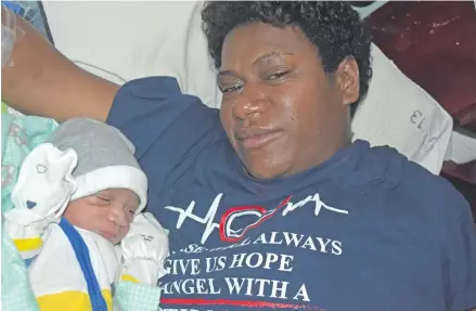  ?? Photo: Laisa Lui ?? Litia Namakadre with her New Year bundle of joy baby Iliesa Kaleca Sivo at the Labasa Hospital on January 1, 2021