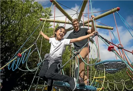  ?? MURRAY WILSON/STUFF ?? Xavier Winter, 11, and mentor Liam van den Brink play at the Esplanade in Palmerston North as part of the Big Brothers Big Sisters programme.
