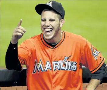  ??  ?? Miami’s Jose Fernandez jokes with fans prior to a game in 2013. Fernandez, the ace right-hander for the Marlins who escaped Cuba to become one of baseball’s brightest stars, was killed in a boating accident early Sunday morning.