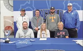  ??  ?? Ringgold head softball coach Daniel Hackett, along with Shawn Cole, were among those at Ringgold on Thursday to watch senior Shelby Cole sign on to play softball for Lee University. Also present for the ceremony was Jake Bradford, Heath Caylor and Ringgold coaches Danny Wiltz and Adam Weldon.