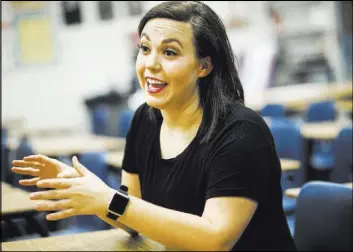  ??  ?? Liberty High School teacher Jessica Maleskey talks Aug.2 about her classroom in Henderson. Class sizes have increased because of budget cuts.