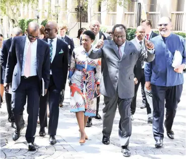  ?? GCIS ?? FINANCE Minister Tito Mboweni and his team arriving at Parliament in Cape Town ahead of his Budget Speech yesterday. | SIYABULELA DUDA