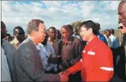  ?? SHEN HONG / XINHUA ?? From left: Ban (left) shakes hands with Zhang Zhaofeng, the Kenya project manager of CNPC Greatwall Drilling Co, in Nairobi in 2011. ZHAO YINGQUAN / XINHUA Chinese sculptor Wu Weishan donates one of his works to Ban during the unveiling ceremony of Wu’s exhibition at the UN Headquarte­rs in New York in 2012.