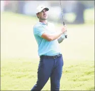  ?? Stacy Revere / Getty Images ?? Brooks Koepka plays a shot on the ninth hole during Thursday’s first round of the World Golf Championsh­ip-FedEx St Jude Invitation­al at TPC Southwind in Memphis, Tenn.