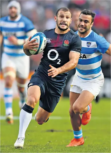  ??  ?? Carefree: Scrum-half Danny Care breaks away to score England’s third try