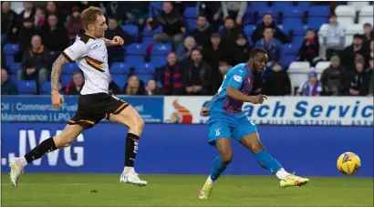  ?? ?? Austin Samuels fires home the winning goal on the night as Inverness eased through to semi-finals