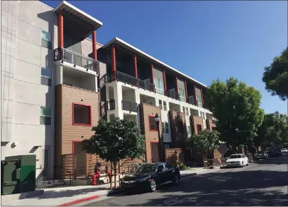  ?? PHOTO BY GEORGE AVALOS ?? A federal judge has shoved Silicon Sage's properties, a fraud-riddled and insolvent Bay Area real estate empire, into receiversh­ip. This apartment building at 138Balbach St. in downtown Jose, a 101-unit complex is one of the properties that was sold.