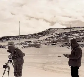  ?? ?? Eddie Robertson in the 1980s, left, when he was director-general of the DSIR; with fellow scientist Peter Macdonald, who also died recently, carrying out magnetic survey measuremen­ts on the ice shelf near Scott Base in 1957; and cutting the cake at the 100th anniversar­y dinner of the Academy of the Royal Society of New Zealand in 2019. He was 100 at the time, and the oldest surviving fellow of the society.