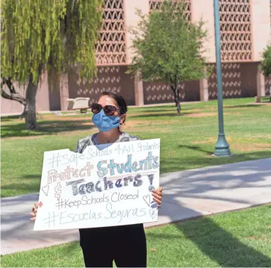  ?? NICK OZA/THE REPUBLIC ?? Felipa Lerma, a parent and educator, protests July 15 at the Arizona Capitol.