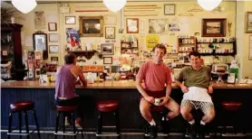  ?? Paul Buckowski/times Union archive ?? Owners of the Rockville Cafe and Bakery, Doug Plummer, far right, and Garth Roberts, second from the right, pose at the counter of their business in Sharon Springs in 1998. Plummer, who led Sharon Springs as mayor since 2013, died on Dec. 14.