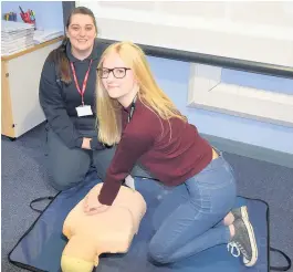  ??  ?? From left, Community First Responder Emily Totty and Alder Grange Sixth Form student Nicola Elliott