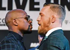  ?? AFP ?? Floyd Mayweather und Conor McGregor geben sich Saures.