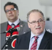  ?? GAVIN YOUNG ?? Calgary Mayor Naheed Nenshi listens as provincial Transporta­tion Minister Brian Mason responds to questions about funding for the Green Line LRT project on Thursday.