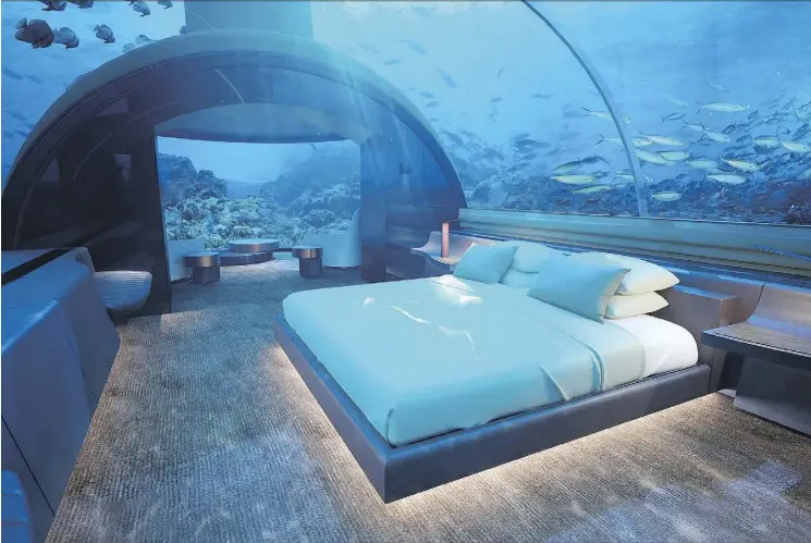  ??  ?? Want to sleep with the fishes? An acrylic dome separates the bedroom from the sea at Conrad Maldives Rangali Island’s luxurious underwater Muraka hotel suite, set to open in November.