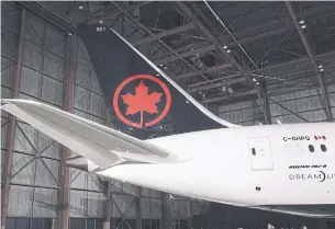  ?? MARK BLINCH THE CANADIAN PRESS FILE PHOTO ?? Analysts have predicted about 1,000 Aeroplan employees — roughly 60 per cent of Aimia’s work force — will transfer to Air Canada if the deal goes ahead.