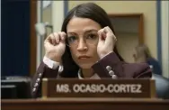  ?? J. SCOTT APPLEWHITE - ASSOCIATED PRESS ?? Rep. Alexandria Ocasio-Cortez, D-N.Y., attends a House Oversight Committee hearing on high prescripti­on drugs prices shortly after her private meeting with Speaker of the House Nancy Pelosi, D-Calif., on Capitol Hill in Washington on Friday. The high-profile freshman and the veteran Pelosi have been critical of one another recently.