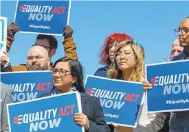  ?? TASOS KATOPODIS/GETTY ?? Supporters of the Equality Act, a comprehens­ive LGBTQ non-discrimina­tion bill, in 2019 at the U.S. Capitol in Washington, D.C.