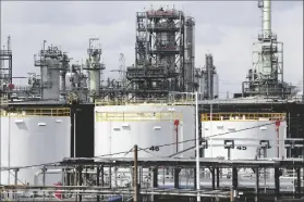  ?? PAUL SANCYA/AP ?? STORAGE TANKS ARE SHOWN AT A REFINERY in Detroit April 21, 2020. The White House on Tuesday said it had ordered 50 million barrels of oil released from strategic reserve to bring down energy costs.