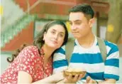  ?? PARAMOUNT ?? Kareena Kapoor Khan, left, and Aamir Khan in“Laal Singh Chaddha,”a Hindi remake of“Forrest Gump.”