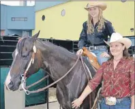  ?? ELIZABETH PATTERSON/CAPE BRETON POST ?? Longtime fan Dawn Cooke got to meet television star Amber Marshall, shown seated on Perfectly In Motion, during this weekend’s Sydney Horse Expo at Centre 200 this weekend.