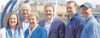  ?? AP ?? Son Tom Ricketts (second from right) condemned racist emails from father Joe Ricketts (second from left).