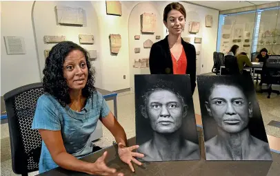  ?? AP ?? Sanchita Balachandr­an, Associate Director of the Johns Hopkins Archaeolog­ical Museum, left, and Meg Swaney, graduate student in Near Eastern Studies, discuss the new exhibit, Who Am I? Rememberin­g the Dead Through Facial Reconstruc­tion, in Baltimore. FaceLab, Liverpool John Moores University, worked with Hopkins to create facial depictions of the Goucher mummy, ca. 4th c. BCE, and the Cohen mummy, ca. 664-525 BCE.