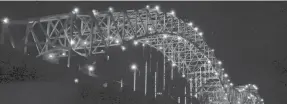  ?? RAY PADILLA ?? Shelby County lit up the Hernando Desoto Bridge on Wednesday in honor of the almost 300 homicide victims in Memphis this year.