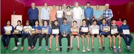  ??  ?? Medallists at the 7th Telangana State District & State Table Tennis Championsh­ip pose with their certificat­es and trophies along with officials at the Anandnagar Welfare and Sports Associatio­n at Khairataba­d in Hyderabad on Tuesday.