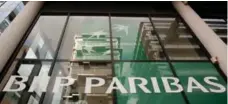  ?? LOIC VENANCE/AFP/GETTY IMAGES FILE PHOTO ?? French banking giant BNP-Paribas, along with Switzerlan­d’s UBS and Bank of America, allegedly created chat rooms to share trading secrets.