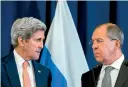  ??  ?? US Secretary of State John Kerry and Russian Foreign Minister Sergei Lavrov during a news conference in Geneva. AFP