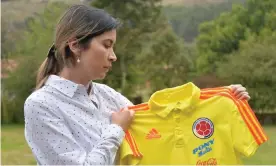  ??  ?? Carolina Rozo pictured with a Colombia jersey in April 2019. Photograph: Diana Sánchez/ AFP/Getty Images