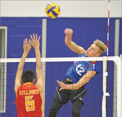  ?? STEVEN MAH/SOUTHWEST BOOSTER FILE PHOTO ?? Wymark’s Henry Rempel (right) will represent Canada on the Youth National Volleyball Team this summer.