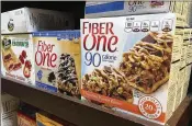  ?? 2017 AP FILE ?? Packaging of Fiber One bars boast of their added fiber, but some critics question the health benefits from some of the ingredient­s used to boost various products’ fiber count as allowed by the FDA.