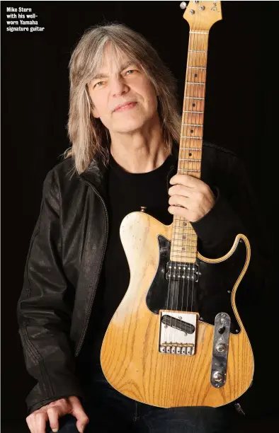  ??  ?? Mike Stern with his wellworn Yamaha signature guitar