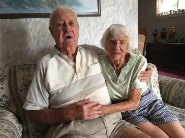  ?? PEG DEGRASSA - MEDIANEWS GROUP ?? Clark and Edith Cain, pictured inside their Glenolden home, will celebrate 70 years of marriage on Aug. 6. The couple met when they both worked at W.T. Grant on Market Street in Philadelph­ia.