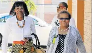 ?? Picture: FREDLIN ADRIAAN ?? UNITY DRIVE: Cheryl Carolus, left, and Hope Malgas arrive at the Chatty Community Hall