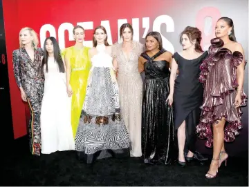  ??  ?? Cast members (from left) Blanchett, Awkwafina, Paulson, Hathaway, Bullock, Kaling, Bonham Carter and Rihanna pose at the world premiere of ‘Ocean’s 8’ at Alice Tully Hall in New York City, New York, on Tuesday. — Reuters photo