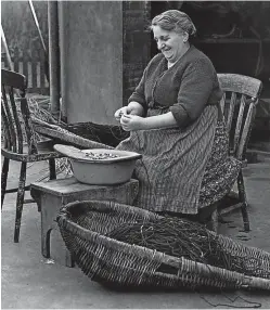  ??  ?? Baiting fishing lines, 1954.