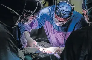  ?? Pictures: MEDICLINIC MORNINGSID­E ?? A BIG FIRST: The unborn baby with spina bifida is operated on to improve the likelihood of it being able to walk one day, and to decrease disabiliti­es.