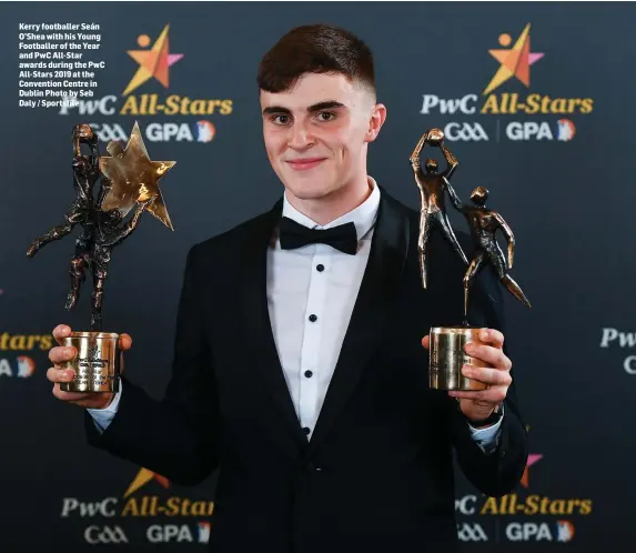  ??  ?? Kerry footballer Seán O’Shea with his Young Footballer of the Year and PwC All-Star awards during the PwC All-Stars 2019 at the Convention Centre in Dublin Photo by Seb Daly / Sportsfile