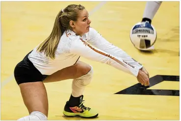  ?? NICK WAGNER / AMERICAN-STATESMAN ?? Autumn Rounsavill­e, a junior, is one of four players in the mix to become the Longhorns’ libero, the defensive specialist who serves as the quarterbac­k of the back line.