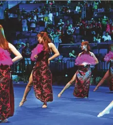  ?? AFP ?? Shows dancers performing during the badminton World Championsh­ips in Nanjing on Sunday.