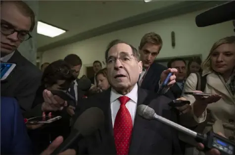  ?? J. Scott Applewhite/Associated Press ?? Rep. Jerrold Nadler, D-N.Y., the top Democrat on the House Judiciary Committee, is met by reporters Friday on Capitol Hill in Washington.